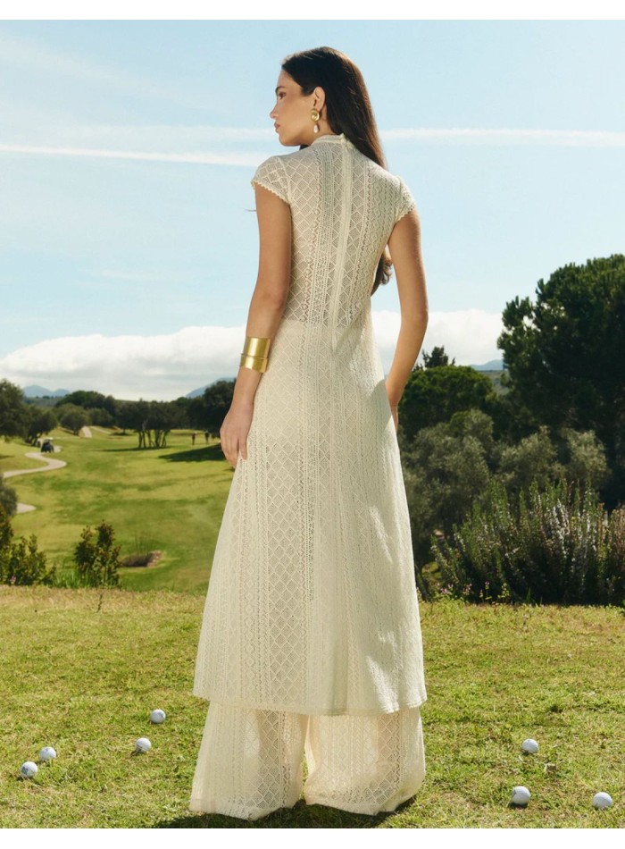 Top en tricot ajouré avec manches capuchon