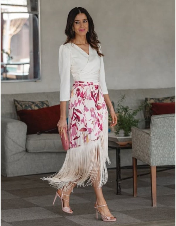 Beige skirt with bangs and printed in pink tones