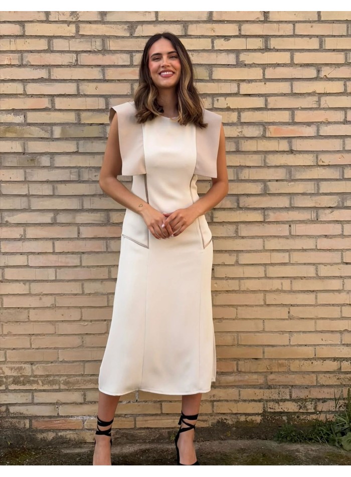 Ivory midi dress with structure on the...