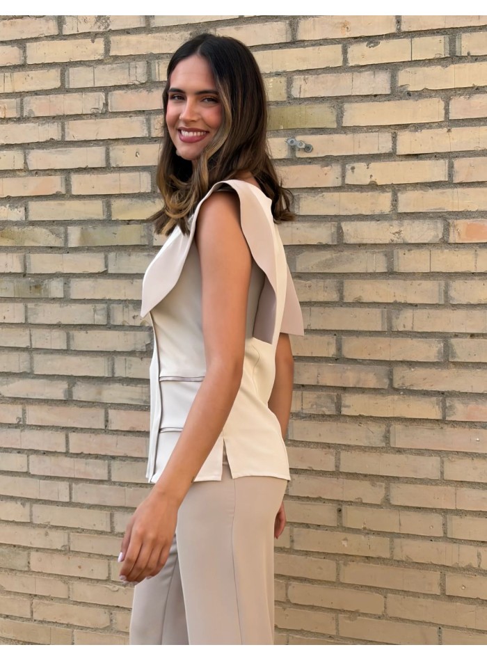 Elegant ivory two-piece ensemble with flowing...