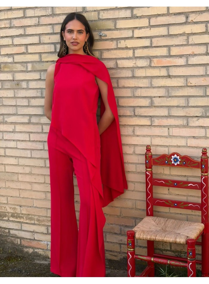 Asymmetrical guest jumpsuit with cape detail