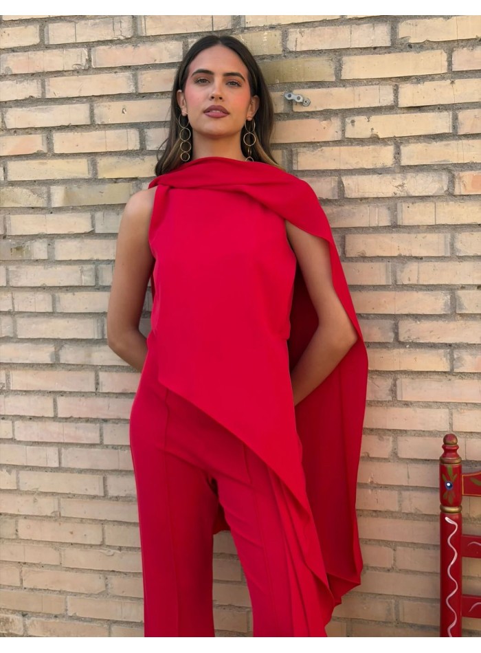 Asymmetrical guest jumpsuit with cape detail