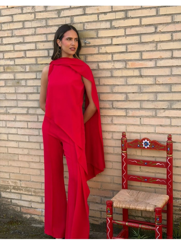 Asymmetrical guest jumpsuit with cape detail