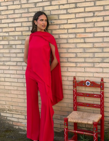 Asymmetrical guest jumpsuit with cape detail