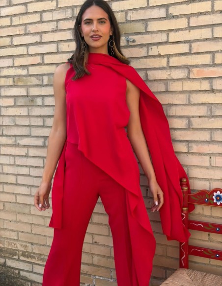 Asymmetrical guest jumpsuit with cape detail