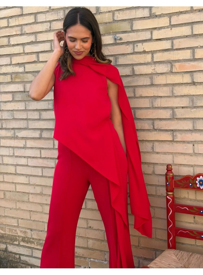 Asymmetrical guest jumpsuit with cape detail