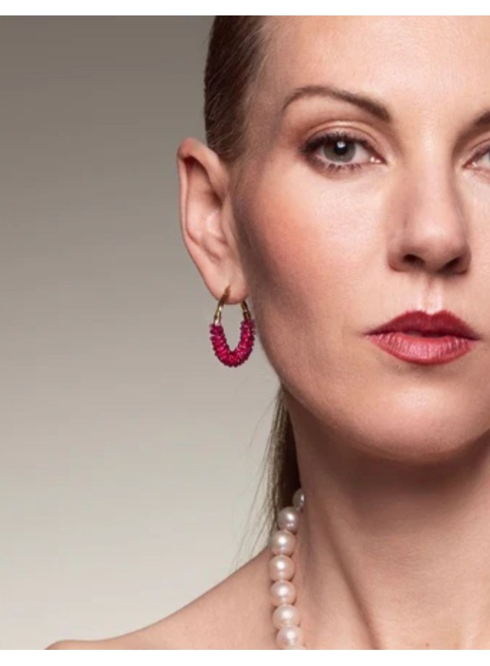 Hoop earrings with magenta details