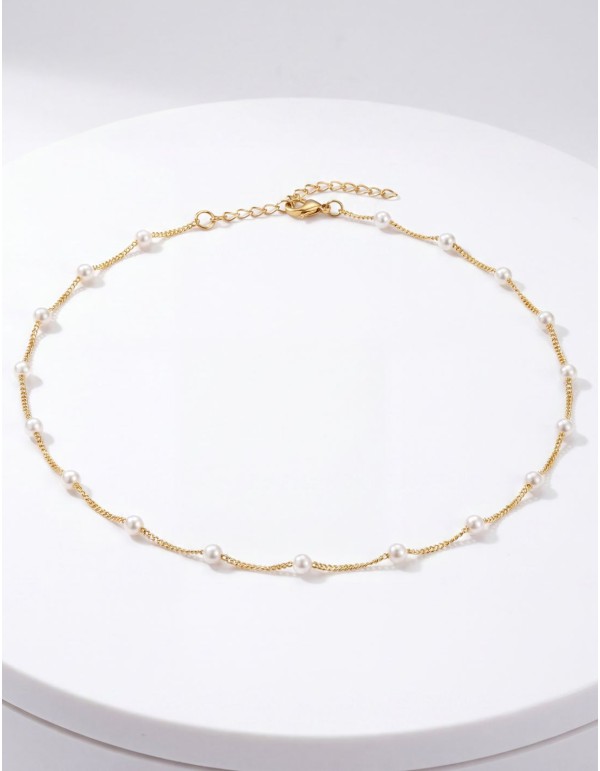 Necklace of fine gold plated steel chain with synthetic...
