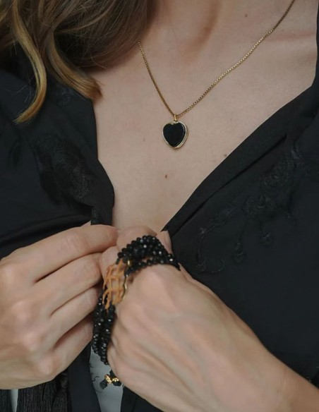 Brazalete de hilos de cristal de murano negro con detalle dorado