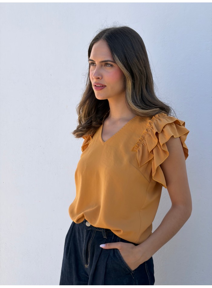 Blouse with subtle V-neckline and ruffled sleeves