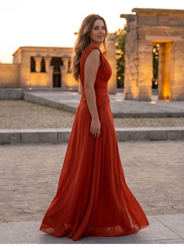 Long russet color dress with V-neck and draped...