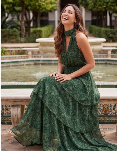 Fluid green printed midi dress with ruffles for guests