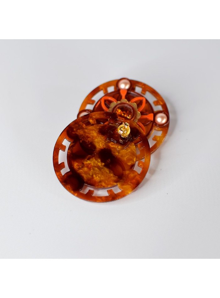 Boucles d'oreilles rondes avec des pierres en...