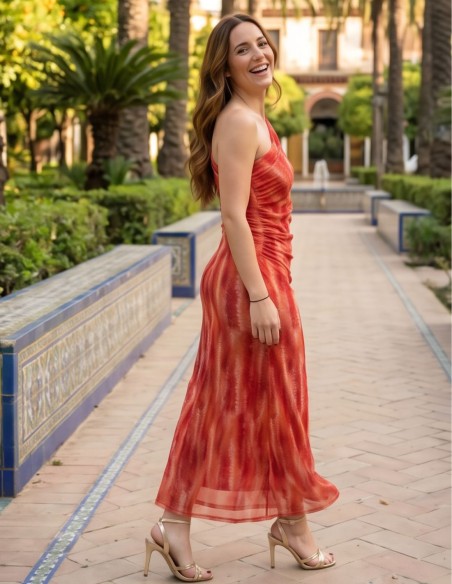 Vestido midi estampado en tono naranja asimétrico con drapeado