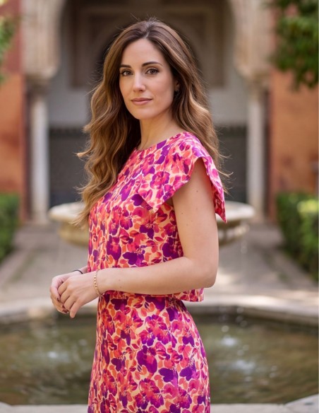 Set in pink and purple tones with structured top and midi skirt