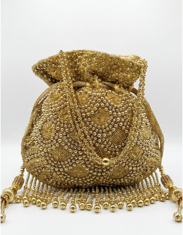 Golden bowler bag with beads and bangs for guests