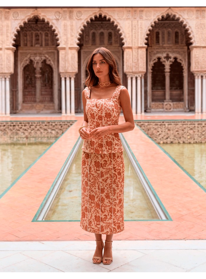 Terracotta colored printed guest dress with...