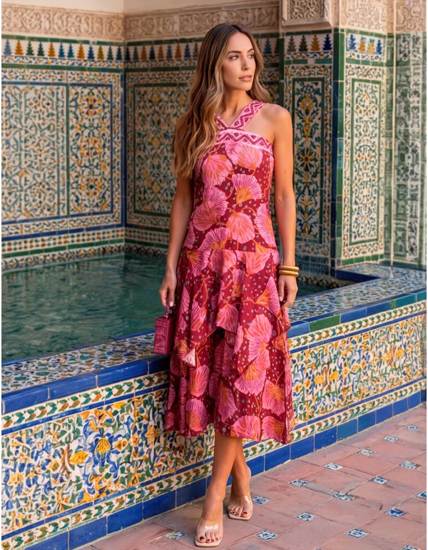 Vestido midi halter estampado en tonos rosas, granates y naranjas con volante