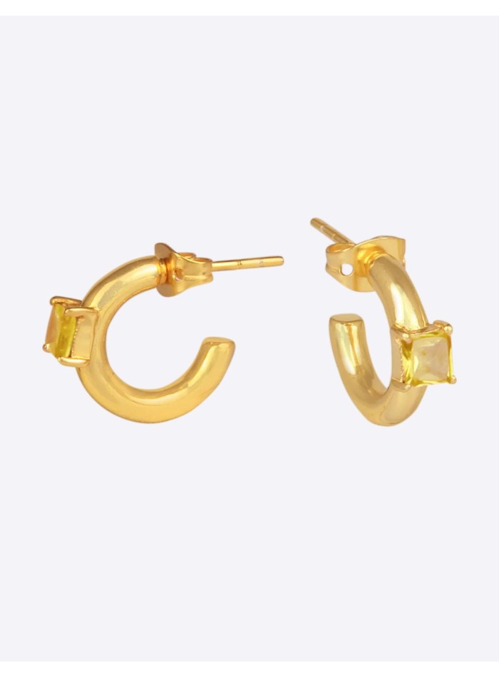 Thick golden earrings with yellow zircons