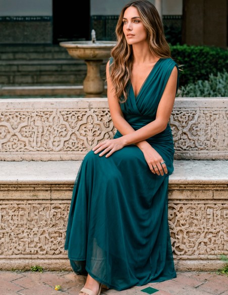 Vestido midi color petróleo con escote halter y falda fluida