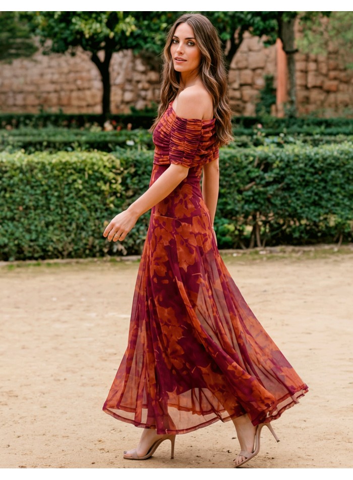 Vestido midi terracota con escote multiposición para invitadas