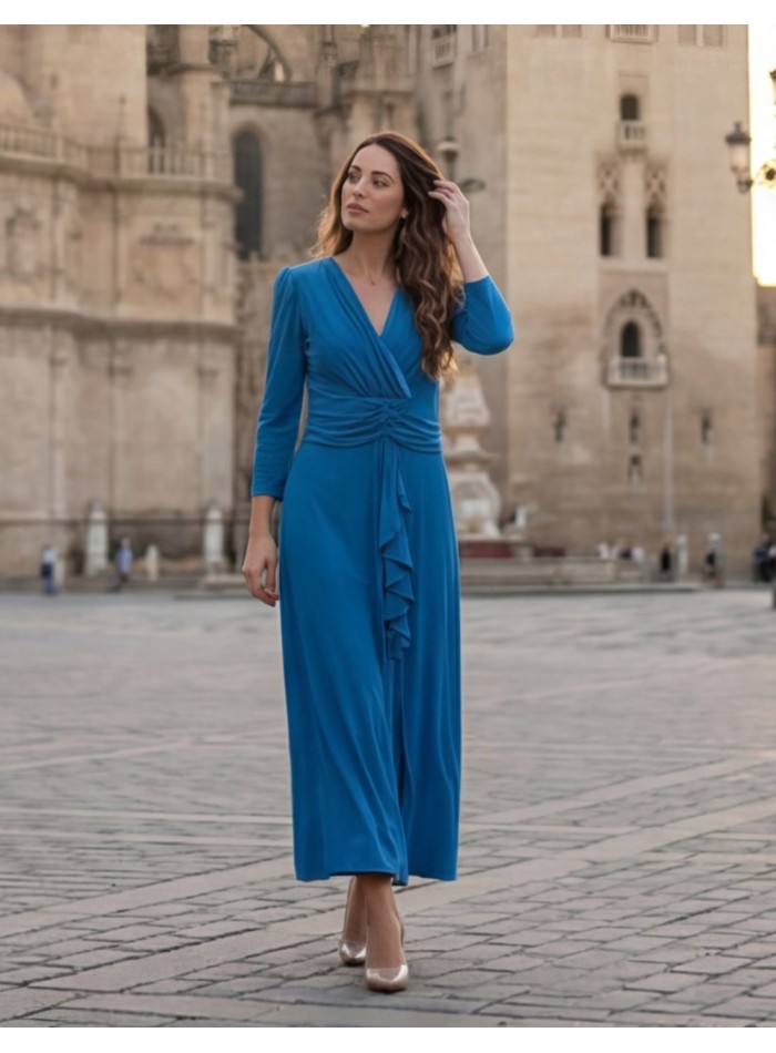 Vestido midi azul con escote en pico y detalle...