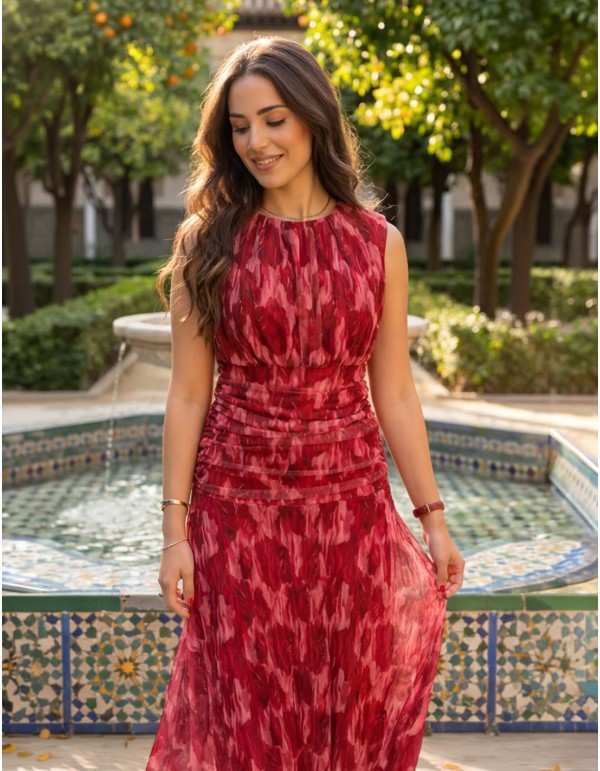 Robe midi imprimée dans les tons roses avec jupe drapée...