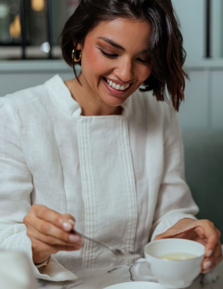 Linen blouse with clean silhouette and structured front panel