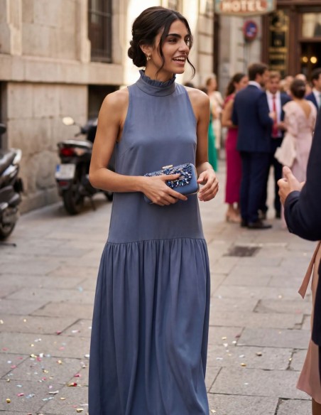 Long blue satin dress with flowing drape and ruffle neckline