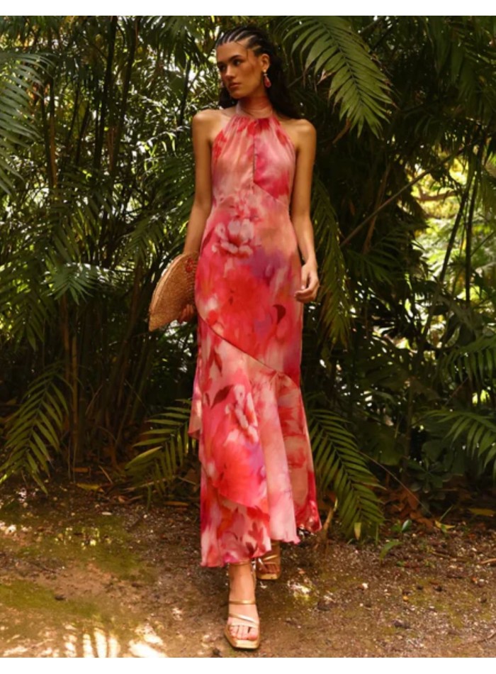 Vestido midi estampado rosa con cuello halter y espalda descubierta
