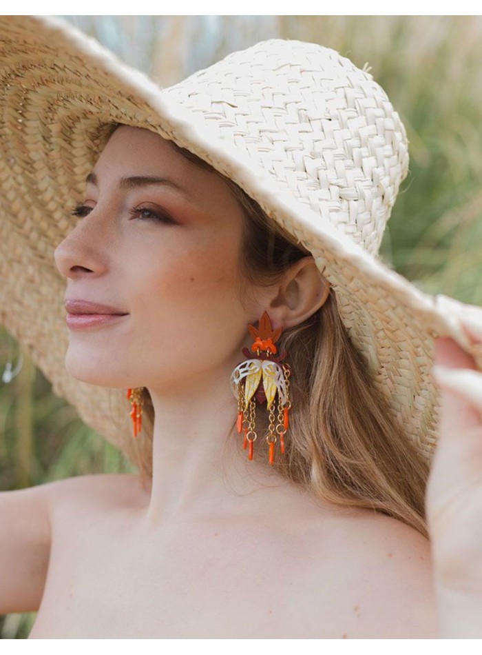 Earrings with beetle design in various colors