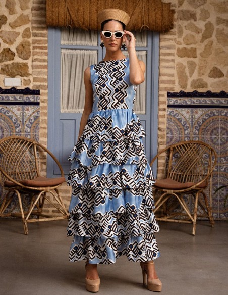 Vestido midi celeste de tirantes con falda de volantes