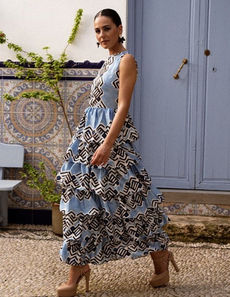 Vestido midi celeste de tirantes con falda de volantes