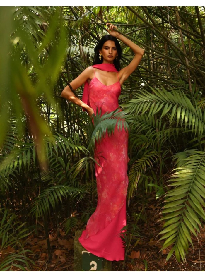 Flowing long dress with thin straps and V-neckline