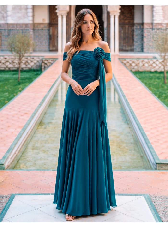 This long duck blue dress is the perfect choice for guests looking for a sophisticated, elegant and different look.