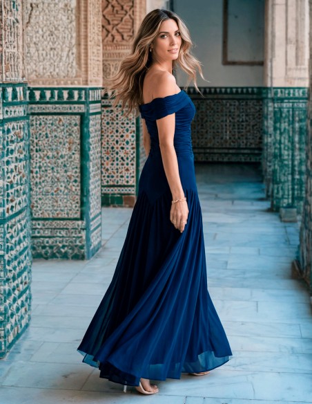 Long navy blue dress with draped flower for guest