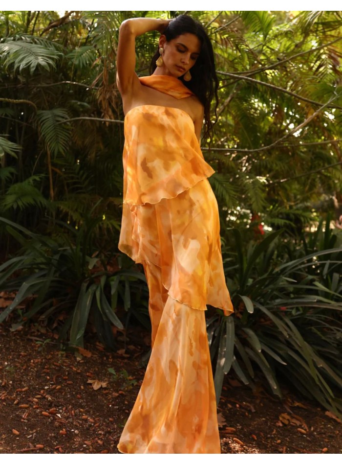 Long strapless dress in orange tones print