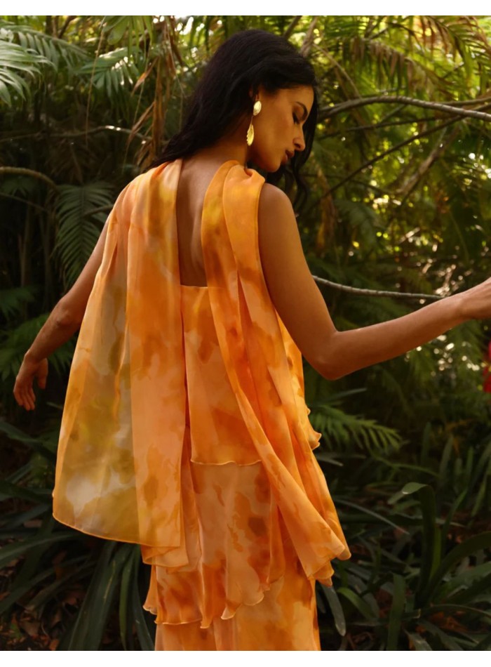 Long strapless dress in orange tones print