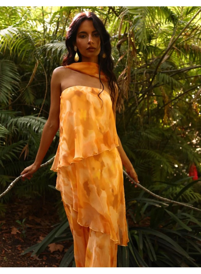 Long strapless dress in orange tones print