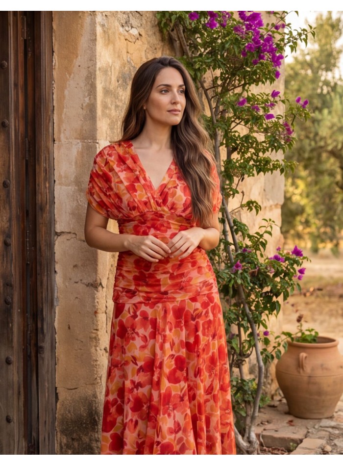 Vestido midi estampado naranja para invitada...
