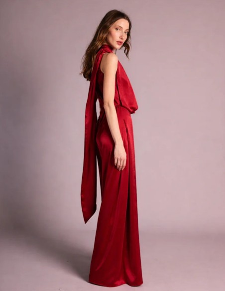 Ruby satin jumpsuit with wide legs and draped bodice