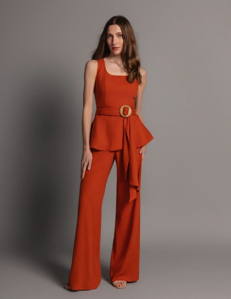 Terracotta-colored linen peplum top with a belt