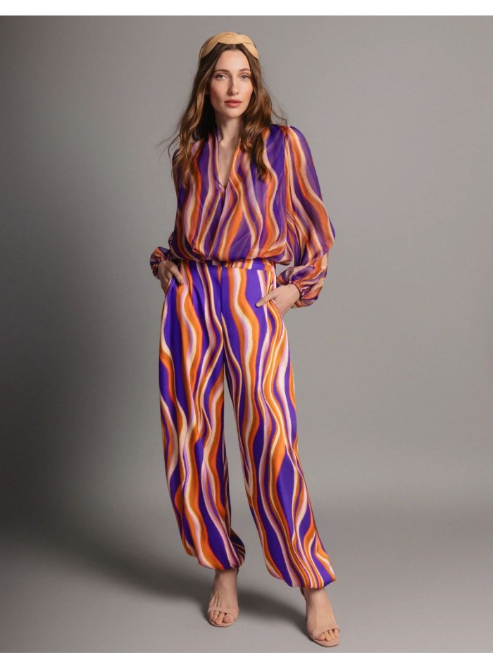 Pantalon bouffant à motifs dans les tons orange...
