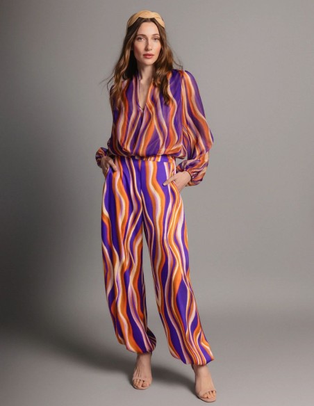 Pantalon bouffant à motifs dans les tons orange et violet