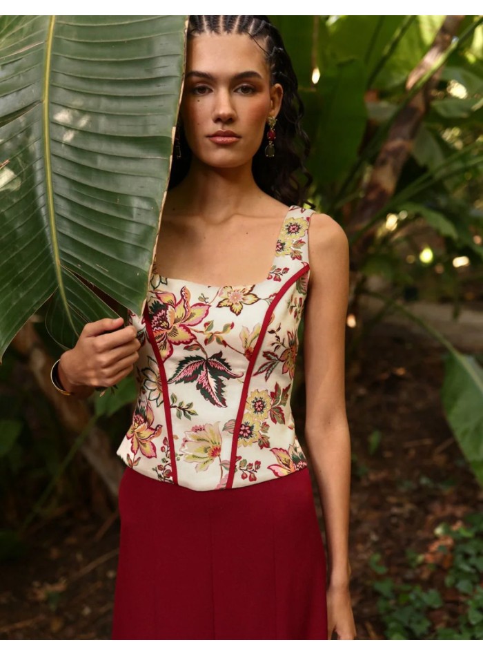 Maroon printed top with a square neckline and...