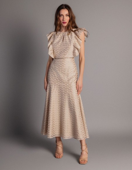 Short top made of Tencel fabric with embroidered ruffle details