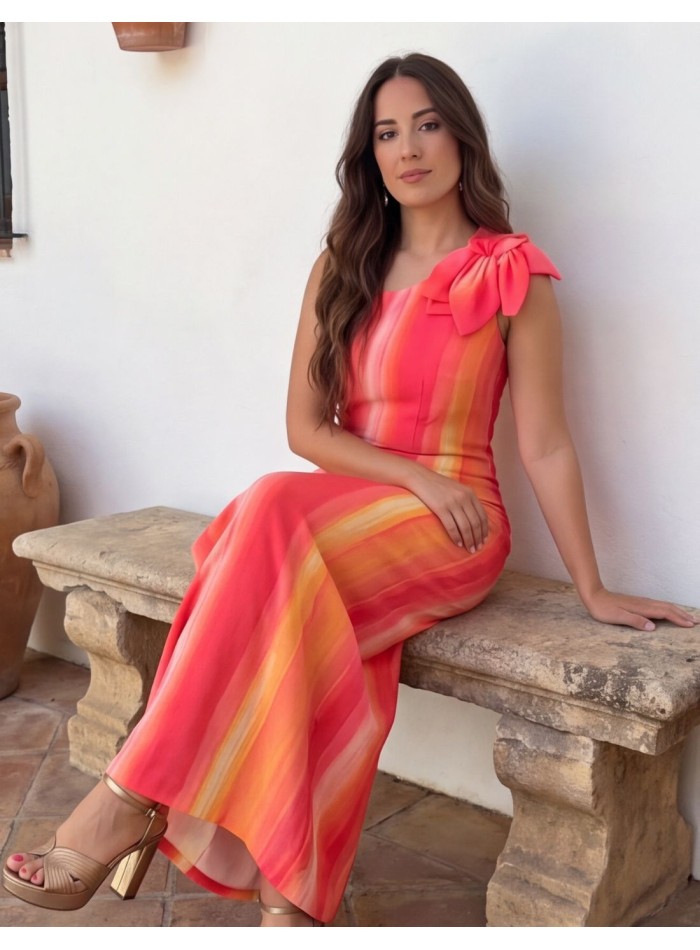 Guest dress in shades of pink and orange with...