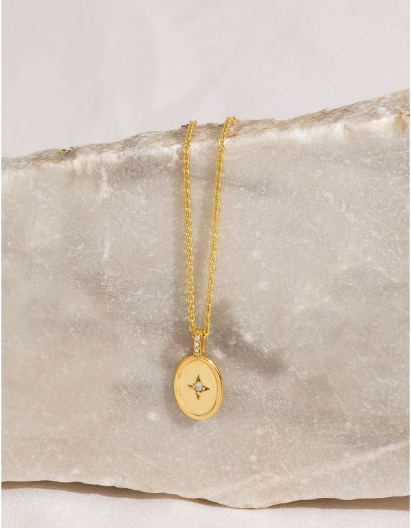 Gold pendant with a medallion adorned with a cubic...