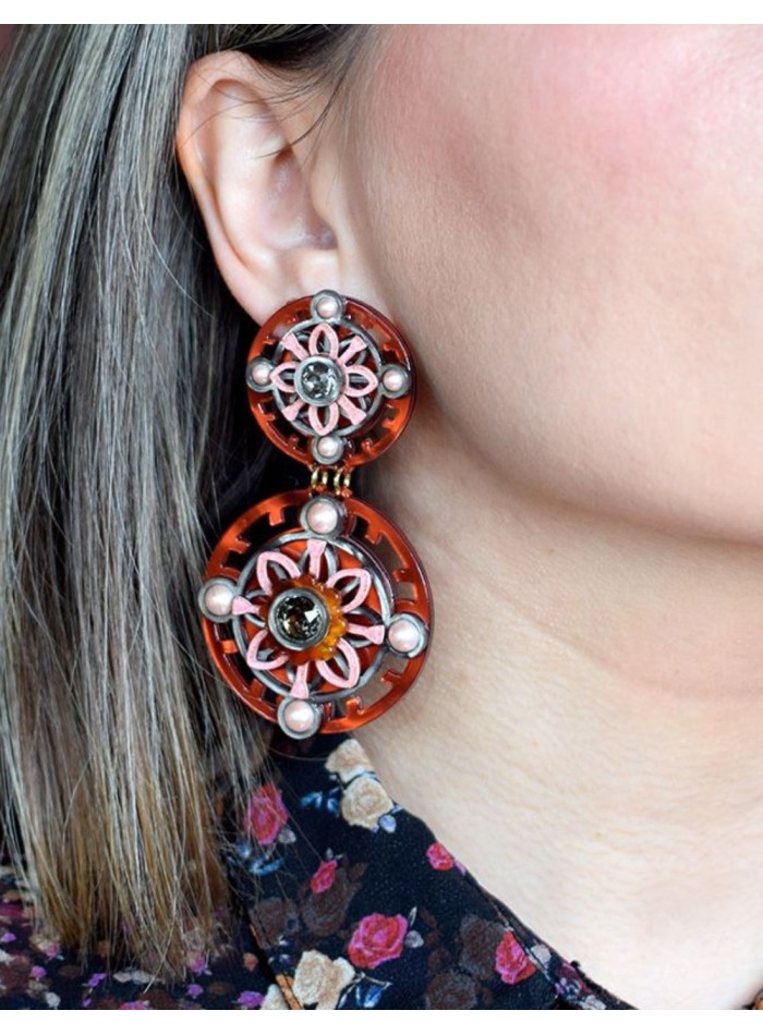 Orange earrings with circles and pearl and...