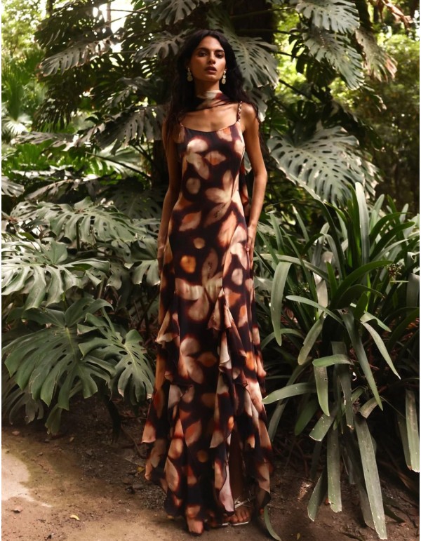 Long, earth-toned printed dress for a wedding guest with...